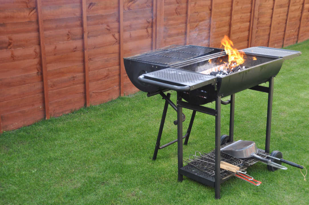 black barbecue grill on a outdoor house garden