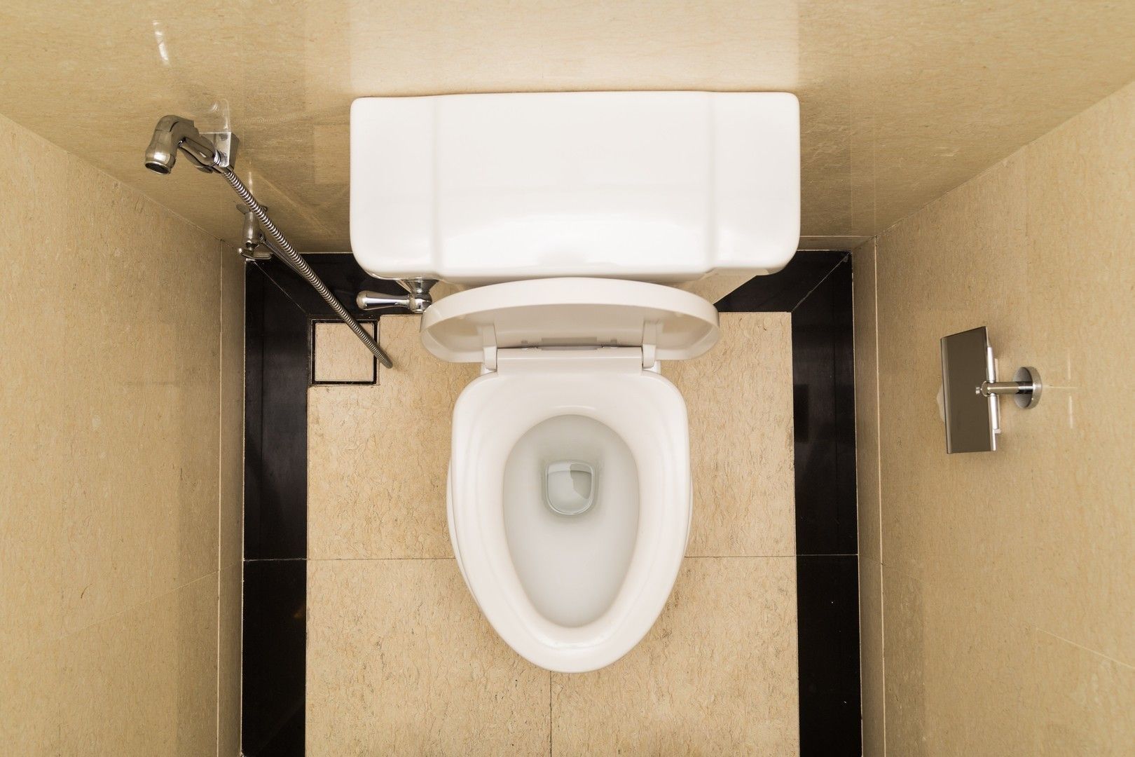 Modern and hygienic toilet bowl with bidet in bathroom