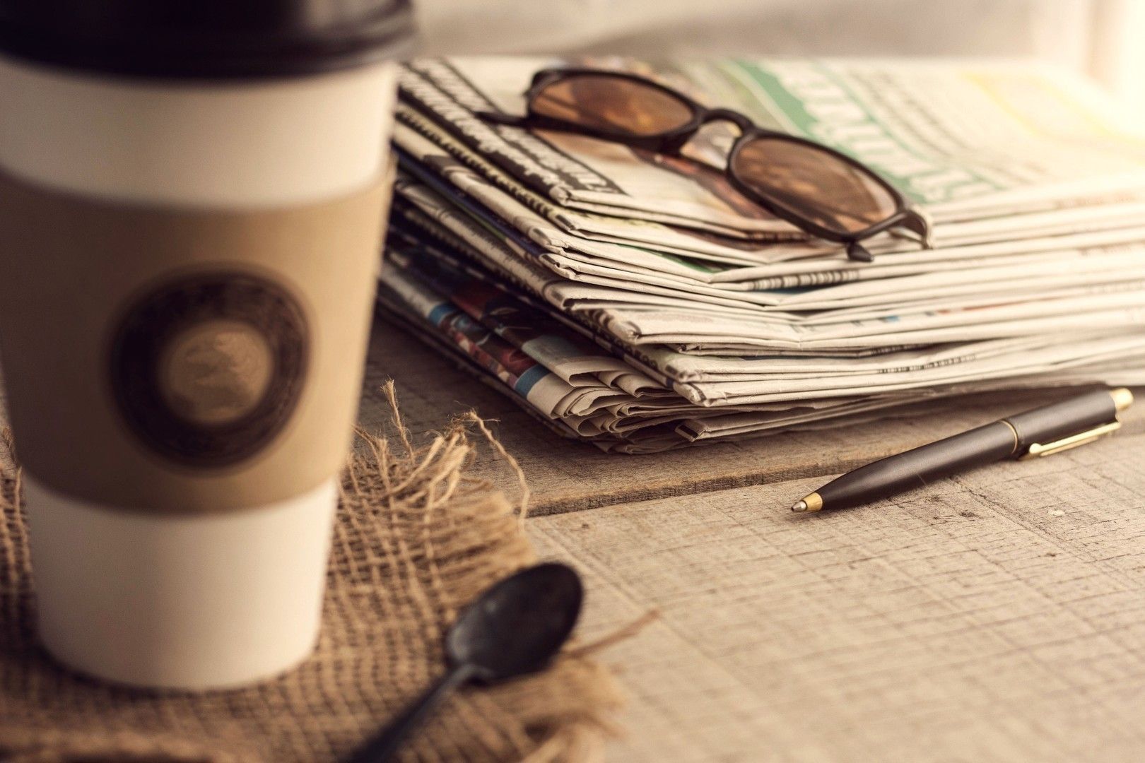 Newspapers on wooden.