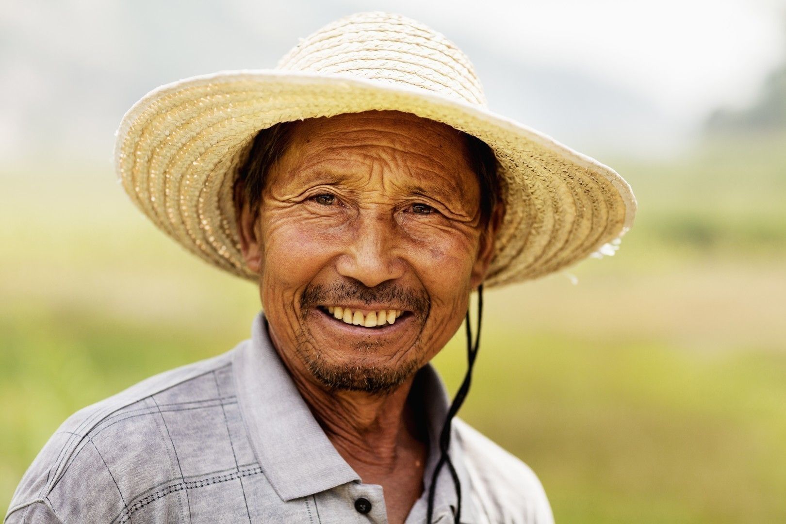 Portrait of smiling farmer, rural China, Shanxi Province
